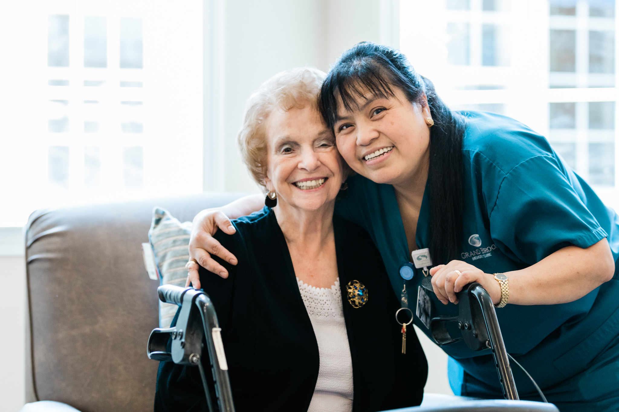 Resident with our care taker at Grand Brook Memory Care of Garland