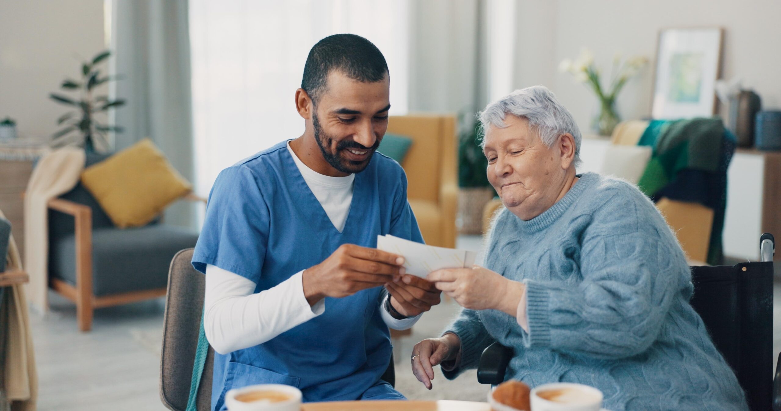 Nurse helping an Alzheimer's patient at a memory care