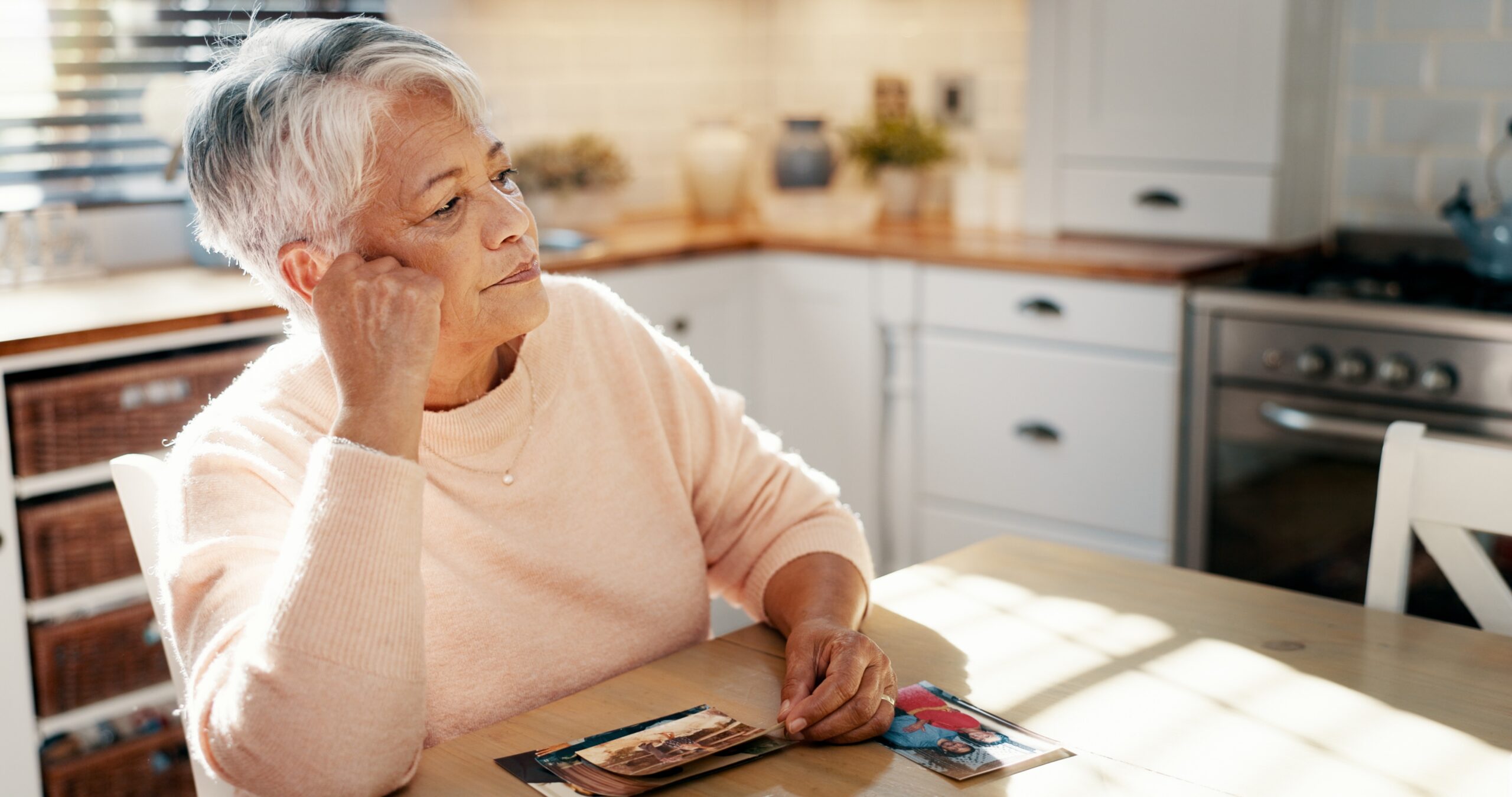 Elderly woman thinking facing memory loss because of dementia.
